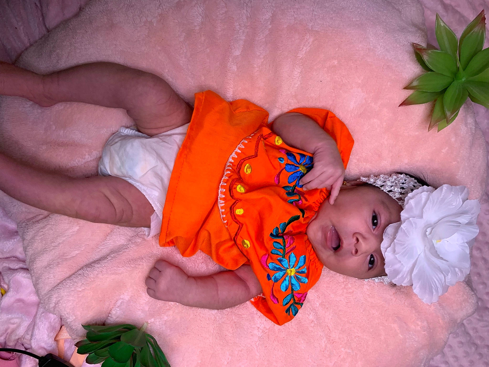 Catalina joined the competition — help win amazing prizes! baby, baby_products, baby_sleeping, baby_toddler_clothing, bedding, bedtime, child, comfort, fashion_accessory, finger, grass, headwear, human_body, linens, nap, orange, pattern, person, pink, skin