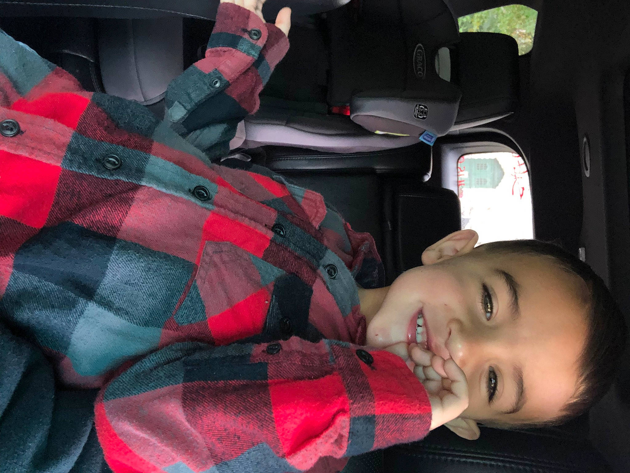 Talon Hiller joined the competition — help win amazing prizes! auto_part, automotive_design, automotive_exterior, automotive_lighting, black, car_seat_cover, comfort, fun, happy, head_restraint, joy, motor_vehicle, pattern, person, personal_luxury_car, plaid, red, smile, steering_wheel, tartan
