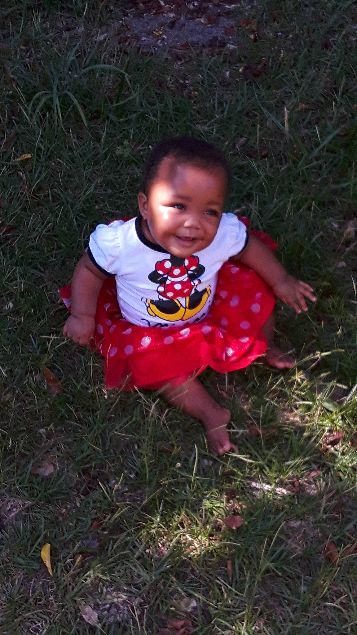 Kimora is registered to the contest to win money with this photo: adaptation, baby, child, fun, grass, joy, leaf, person, plant, play, sitting, toddler