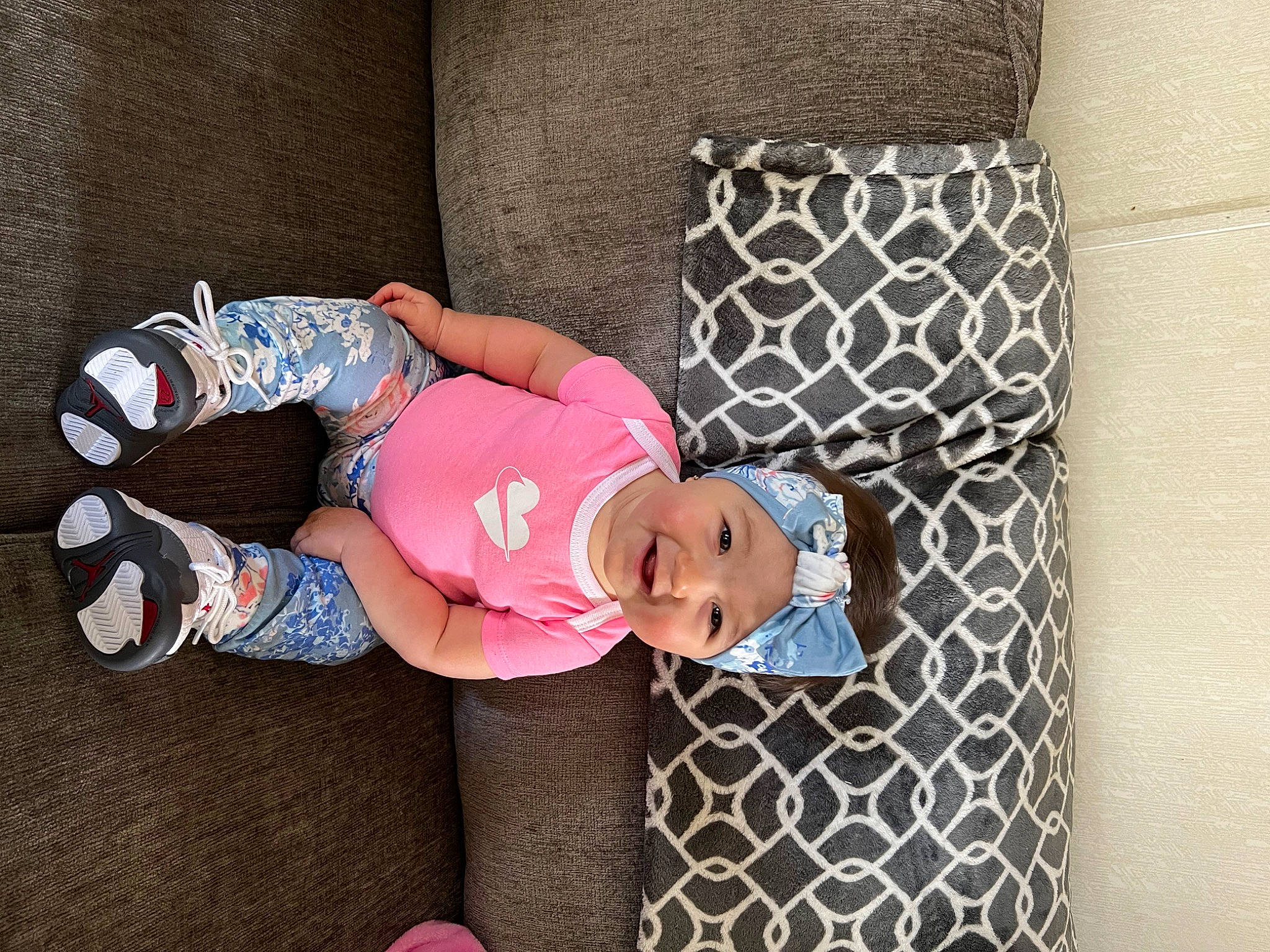 Aveyana joined the competition — help win amazing prizes! arm, baby, baby_products, baby_toddler_clothing, child, comfort, couch, flooring, hat, headwear, linens, magenta, pattern, person, pink, product, sleeve, sock, t_shirt, textile