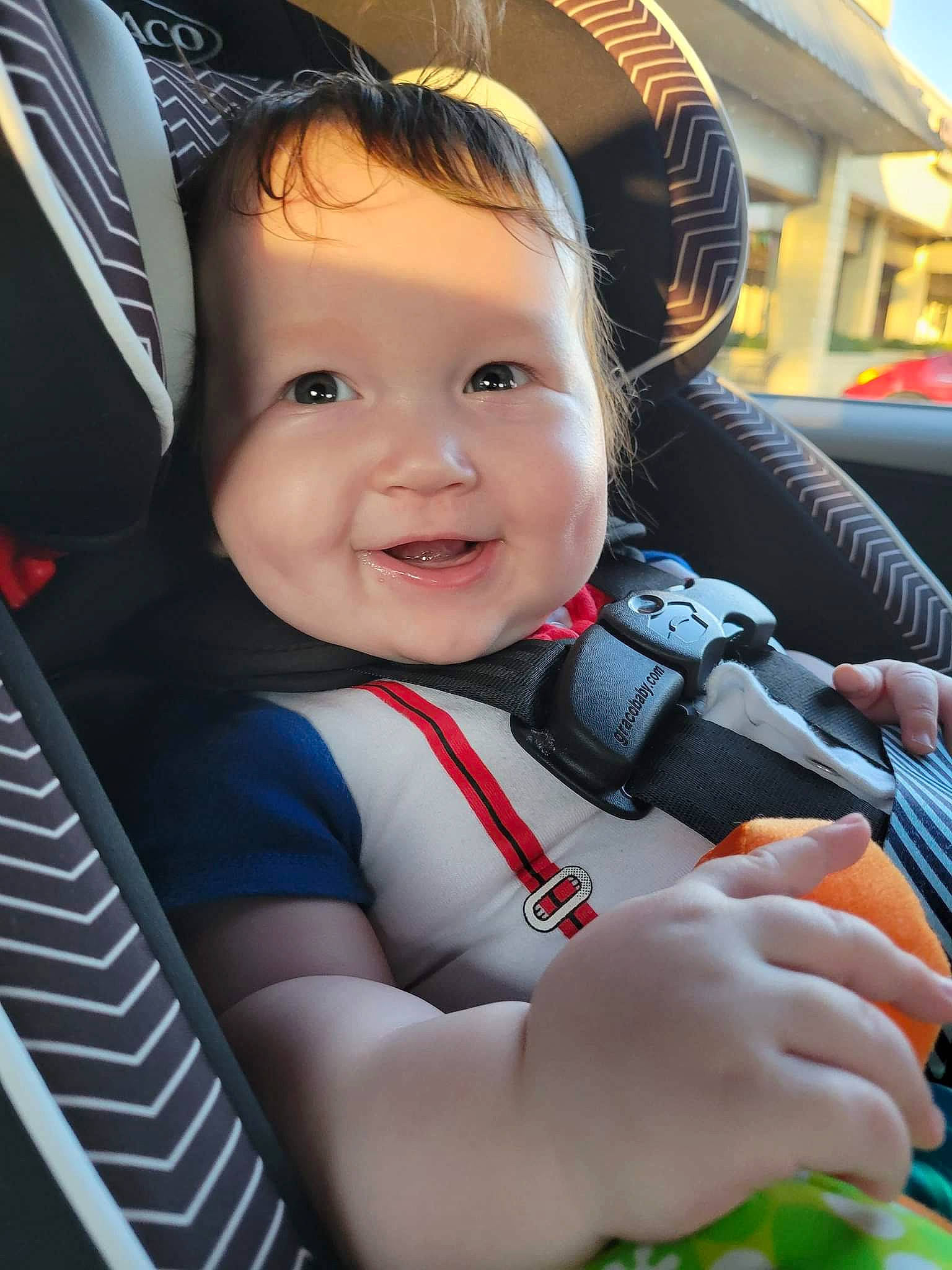 Jacob joined the competition — help win amazing prizes! auto_part, automotive_design, baby, baby_carriage, baby_products, car_seat, child, electric_blue, eye, facial_expression, fun, happy, iris, joy, motor_vehicle, person, plant, skin, smile, steering_wheel