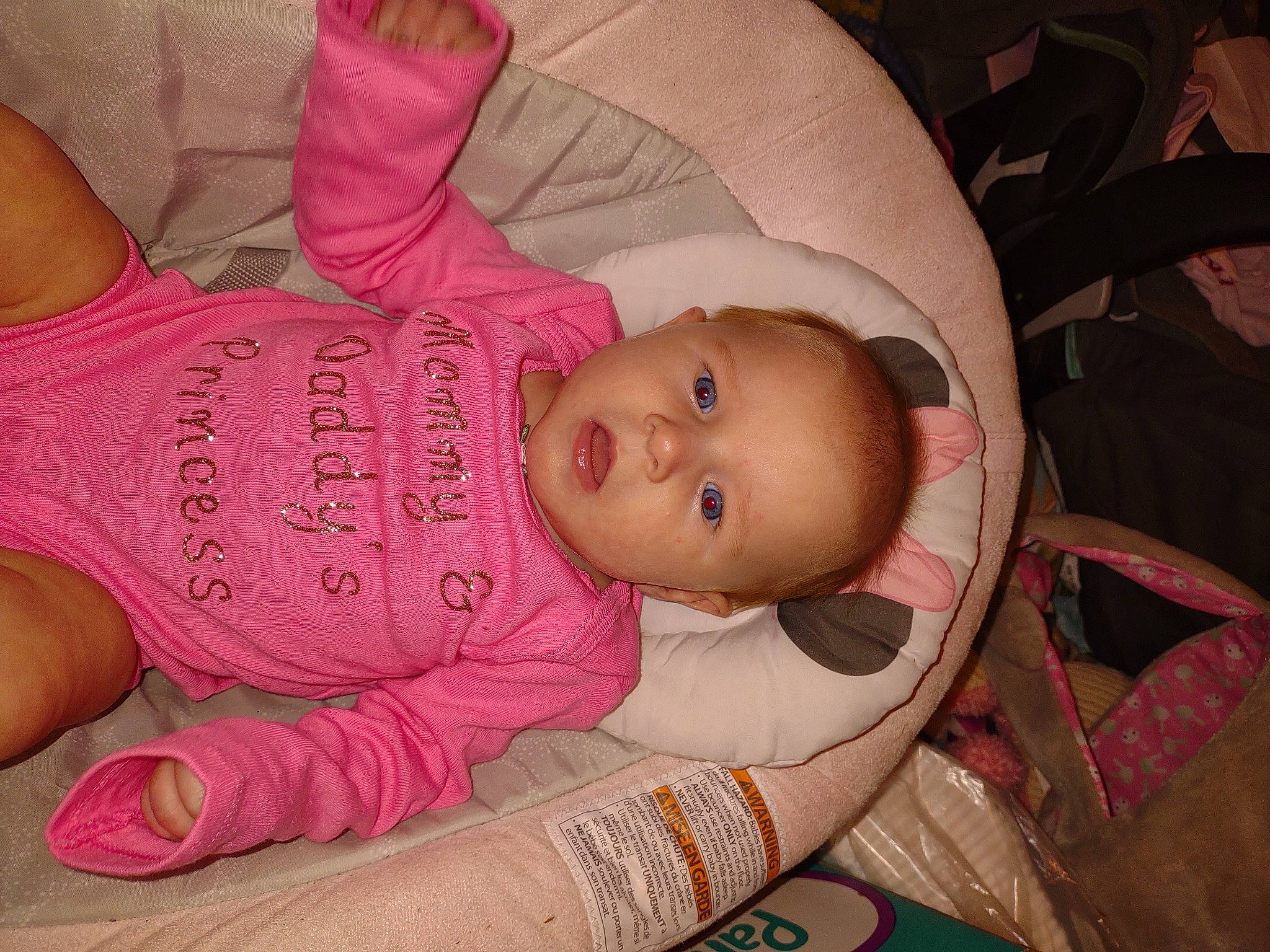 Kathleen is registered to the contest to win money with this photo: arm, baby, baby_products, baby_toddler_clothing, cheek, chin, clothing, comfort, eye, eyelash, face, head, human_body, lip, mouth, nail, person, pink, product, skin