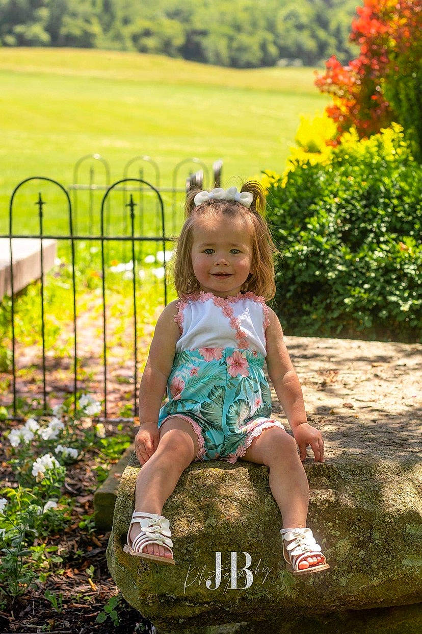 Kynslee is registered to the contest to win money with this photo: baby_toddler_clothing, beauty, dress, flower, grass, grass_family, green, hair, happy, joy, leisure, nature, people, people_in_nature, person, photograph, plant, shorts, sneakers, summer