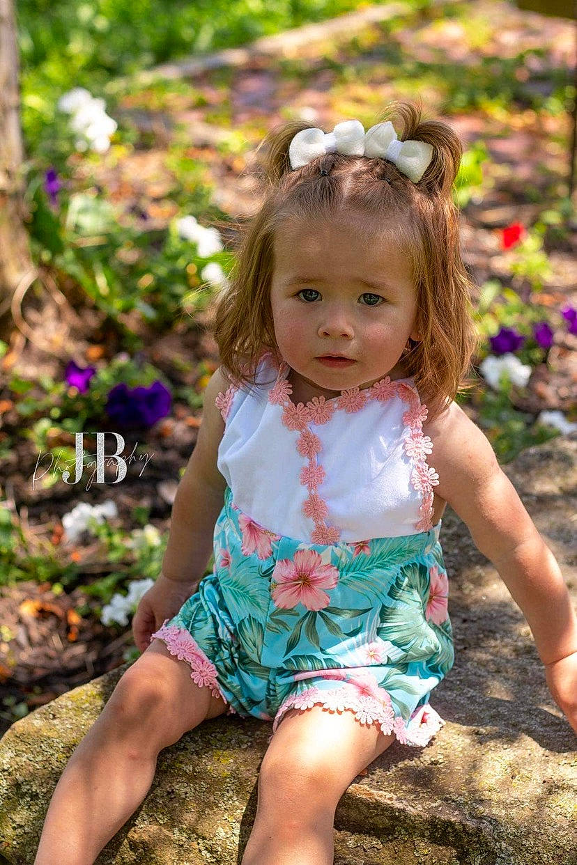 Kynslee is registered to the contest to win money with this photo: baby_toddler_clothing, beauty, botany, child, face, fawn, grass, happy, human_body, iris, leisure, nature, people_in_nature, person, pink, plant, purple, skin, summer, thigh