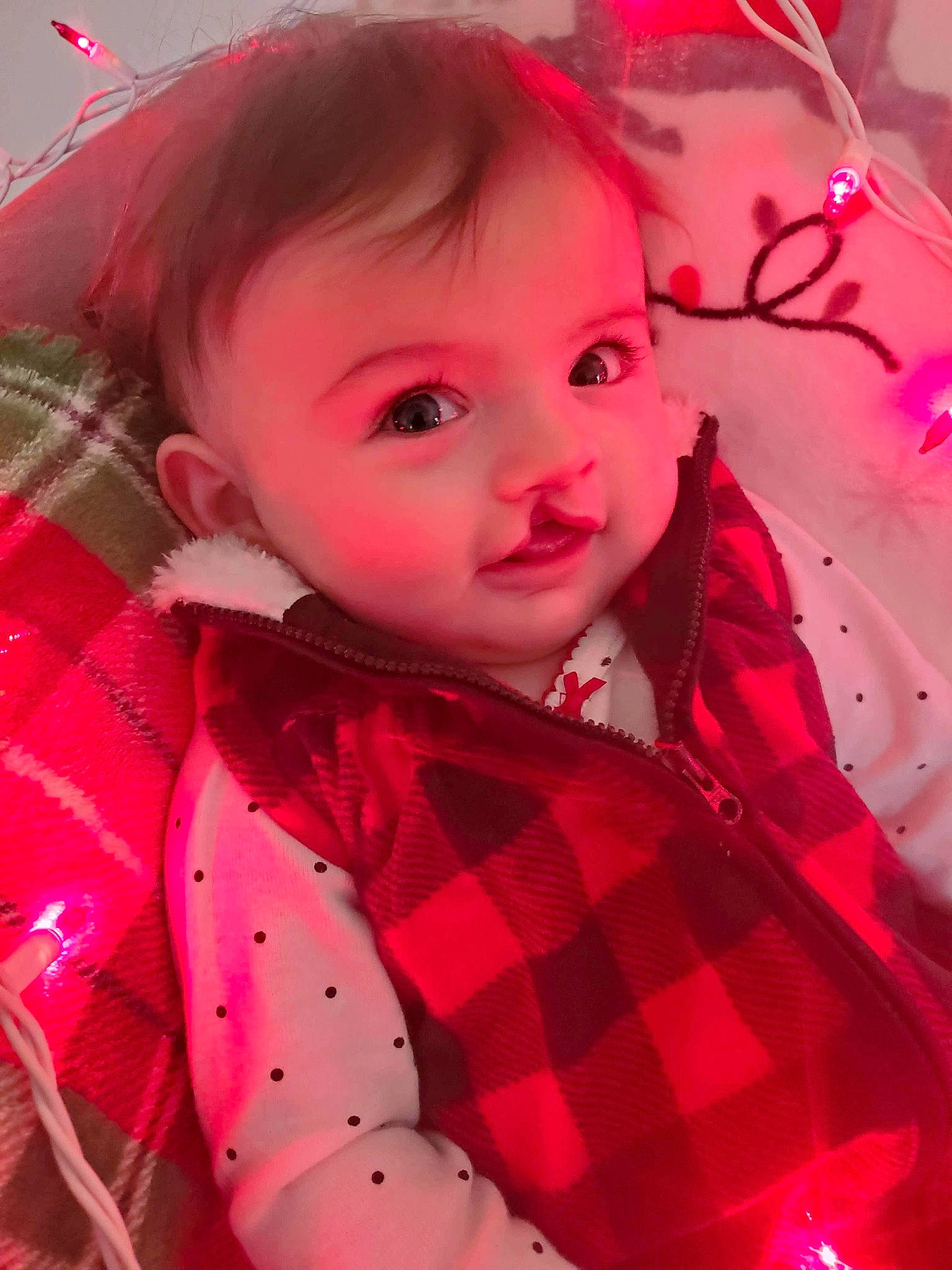 Alison is registered to the contest to win money with this photo: baby, baby_toddler_clothing, cheek, child, child_model, eyelash, forehead, iris, lip, magenta, pattern, peach, person, pink, plaid, portrait_photography, red, skin, tartan, textile