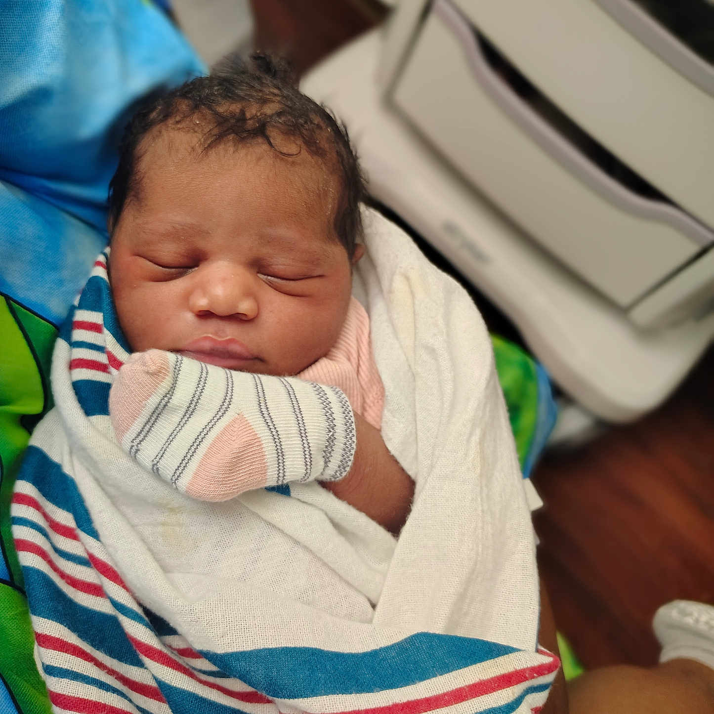 K-Laylee is registered to the contest to win money with this photo: newborn, baby, infant, sleeping, wrapped, blanket, mittens, hospital, person, child, cute, peaceful, closeup, portrait, indoor, human, skin, face, head, sleep