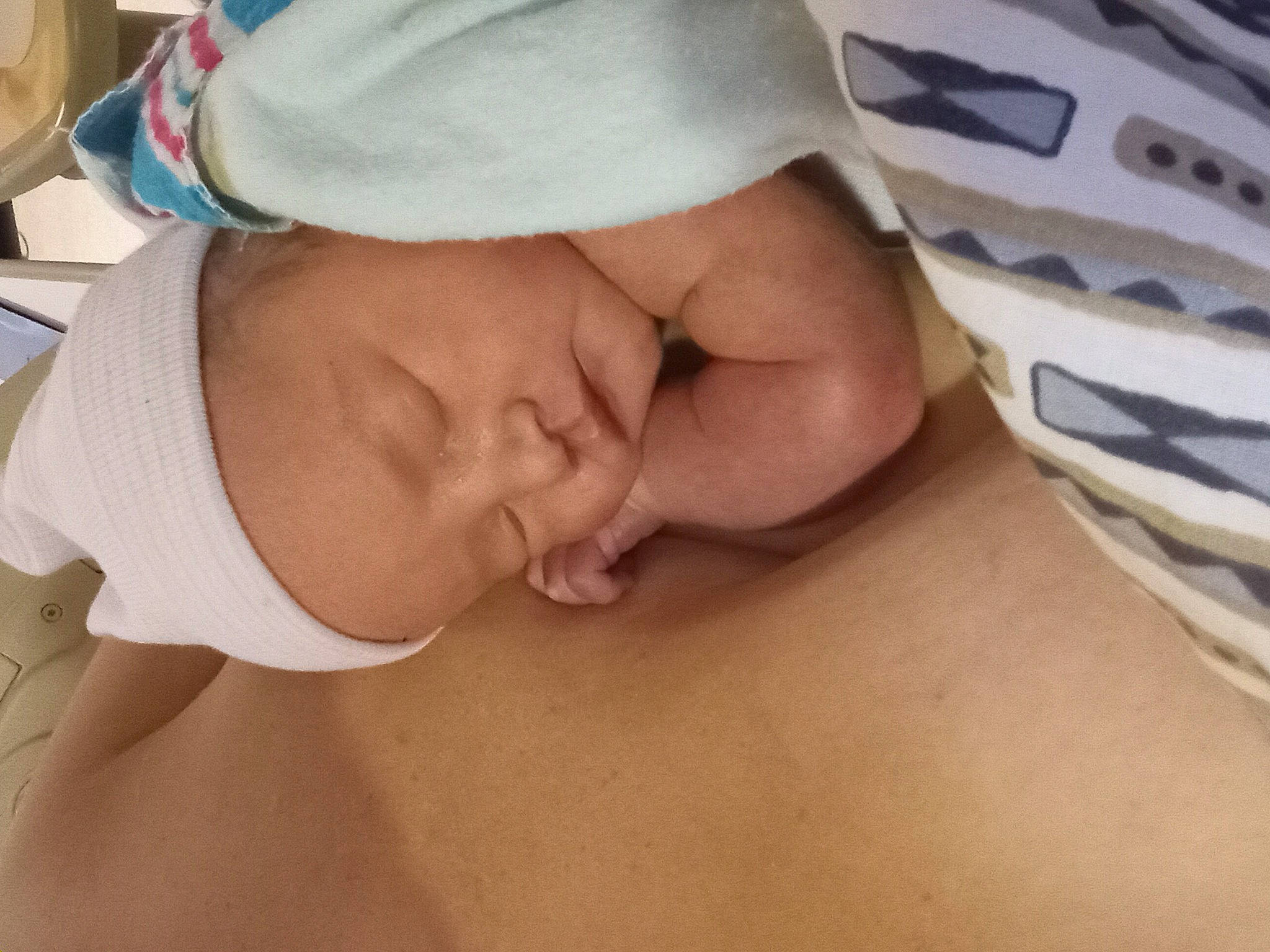 Cheryl is registered to the contest to win money with this photo: abdomen, baby, cap, chest, child, comfort, elbow, eyelash, fashion_accessory, gesture, hat, headgear, human_leg, linens, nail, neck, person, service, sleep, toddler