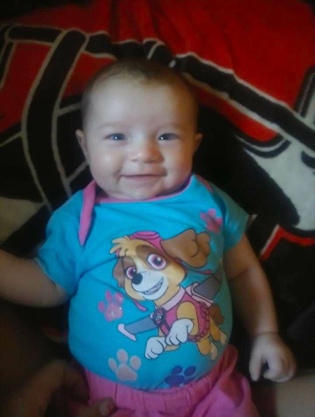 Alyson is registered to the contest to win money with this photo: arm, cheek, child, cool, day, eye, face, facial_expression, fun, head, infant, mouth, nose, person, pink, play, product, skin, smile, toddler