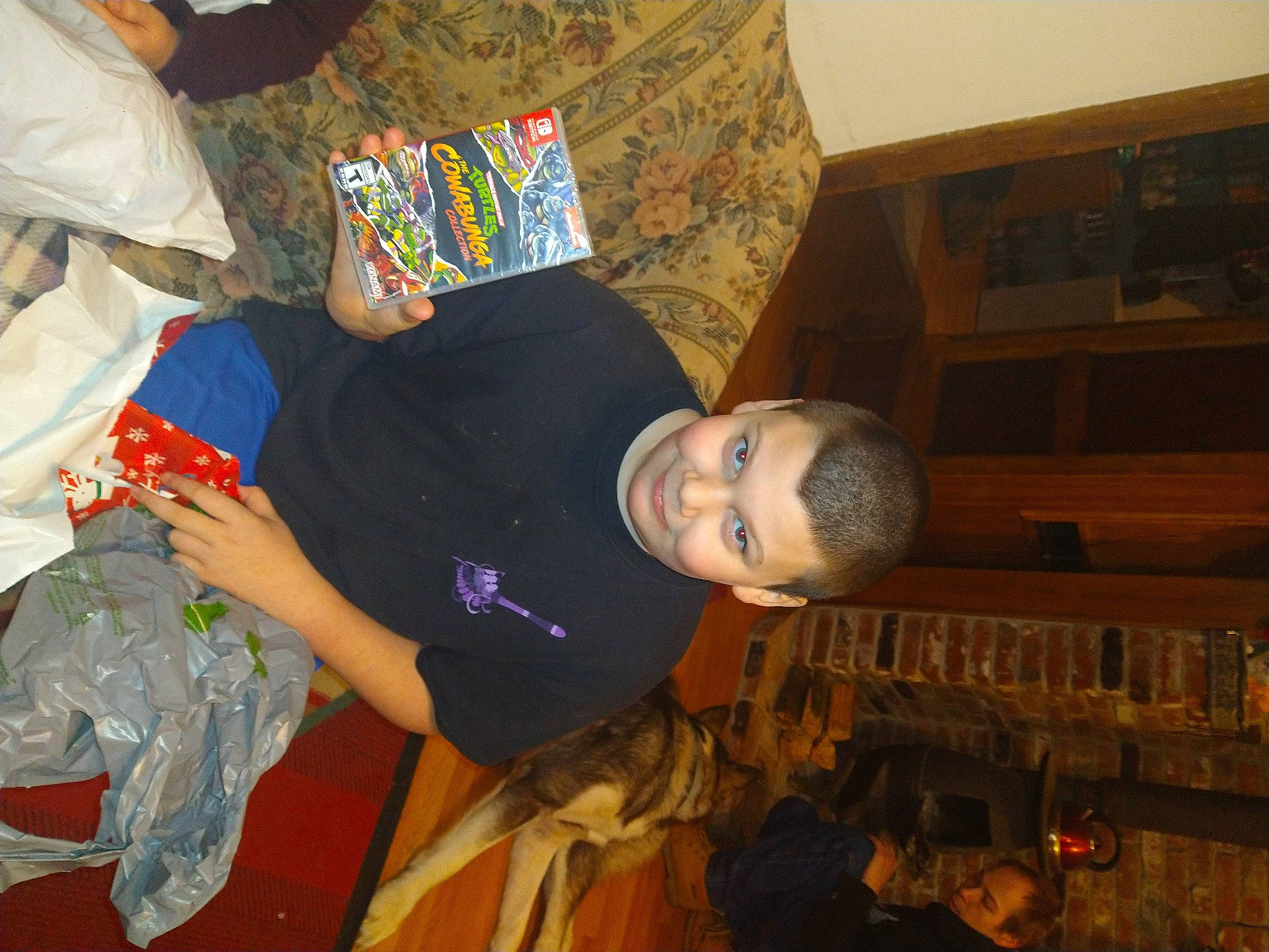 Isaac is registered to the contest to win money with this photo: art, fun, hat, joy, pattern, person, room, t_shirt, temple, textile, visual_arts, wood, world