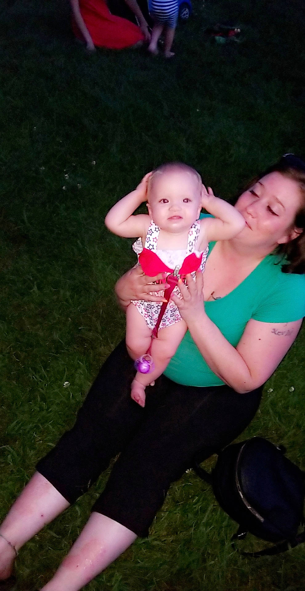 Aryanna is registered to the contest to win money with this photo: abdomen, child, daughter, finger, fun, grass, happy, joy, leg, person, photography, pink, sitting, skin, smile, toddler, trunk