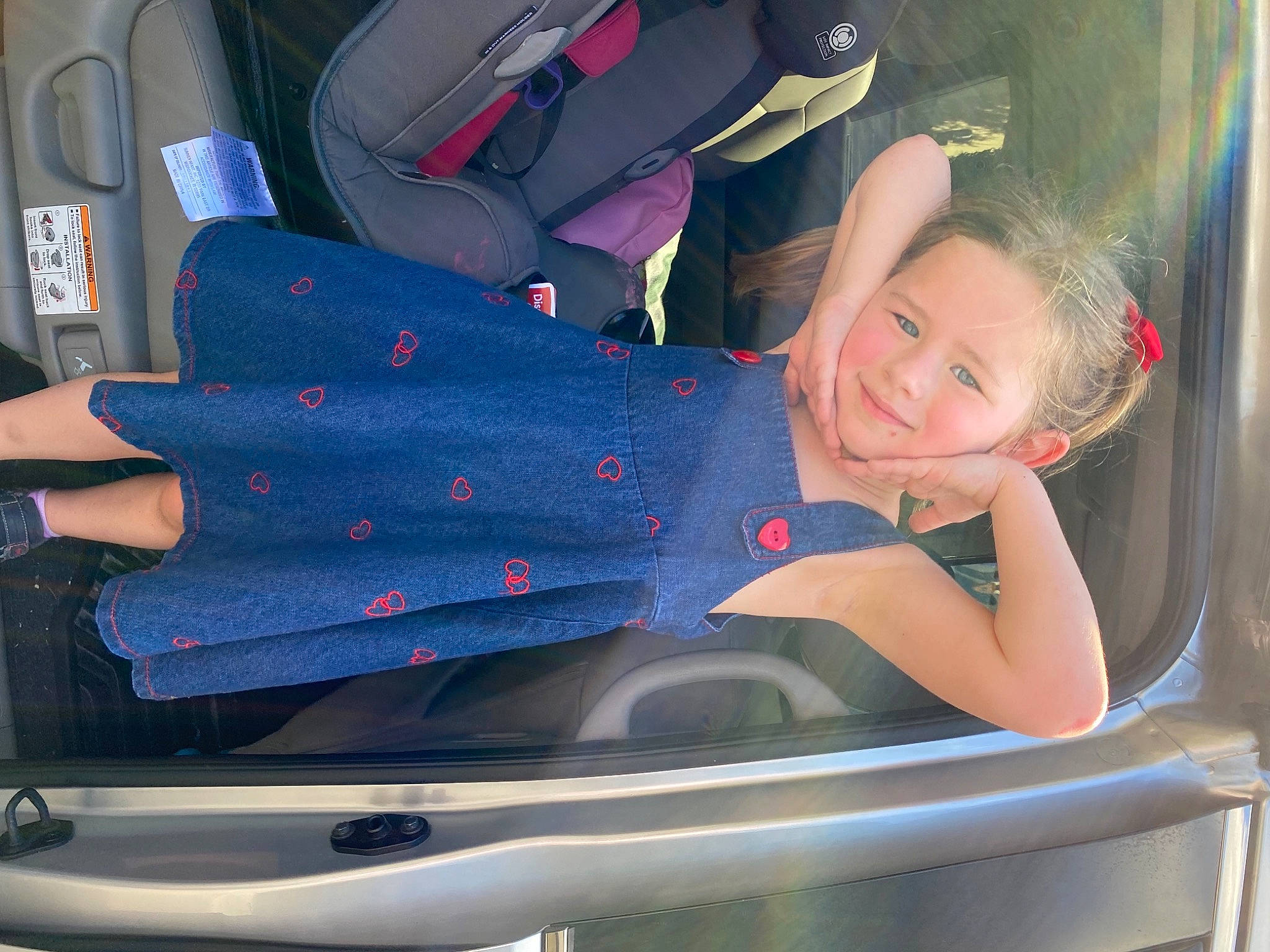 Carolina joined the competition — help win amazing prizes! auto_part, automotive_design, automotive_exterior, bumper, car, car_seat, car_seat_cover, comfort, electric_blue, family_car, fun, human_leg, joy, motor_vehicle, person, personal_luxury_car, smile, thigh, toddler, trunk