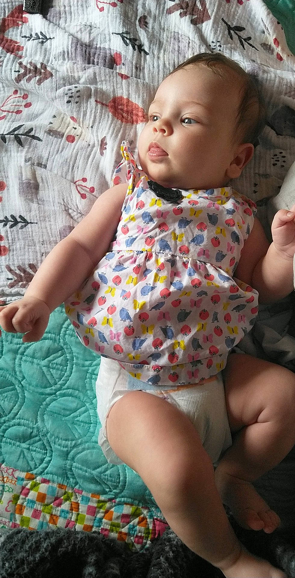 Marceline is registered to the contest to win money with this photo: baby, baby_toddler_clothing, child, dress, eye, face, fashion_design, hand, happy, head, human_body, human_leg, linens, lip, pattern, person, pink, skin, sleeve, thigh