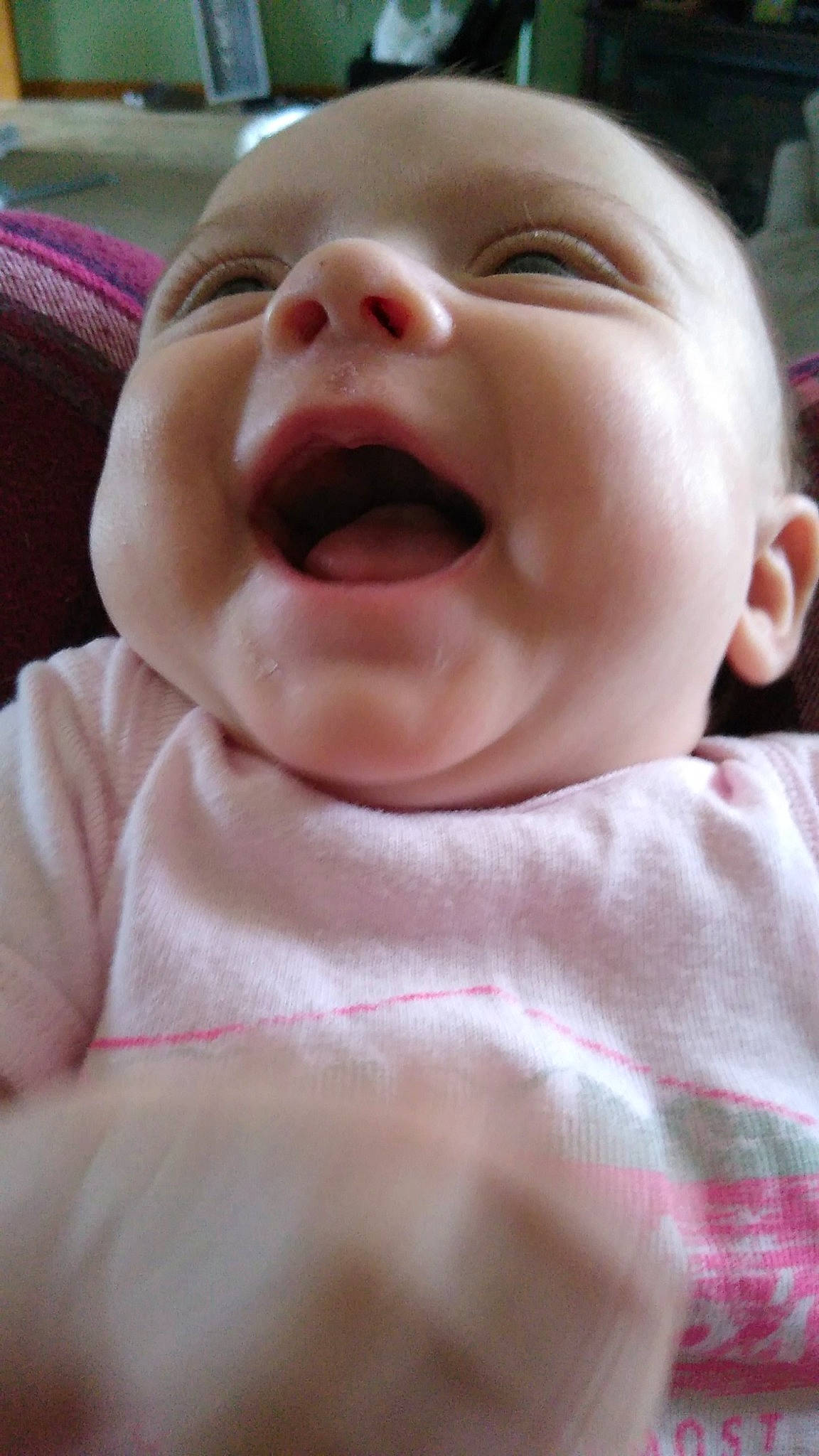 Emilee is registered to the contest to win money with this photo: baby, baby_laughing, cheek, child, chin, comfort, ear, eyelash, gesture, happy, jaw, lip, mouth, nose, person, pink, skin, sleeve, smile, toddler