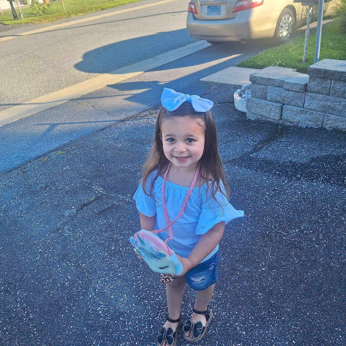 Nova Grace is registered to the contest to win money with this photo: baseballcap, cap, child, city, clothing, face, female, footwear, girl, hat, head, pants, person, photography, portrait, road, sandal, shoe, street, urban