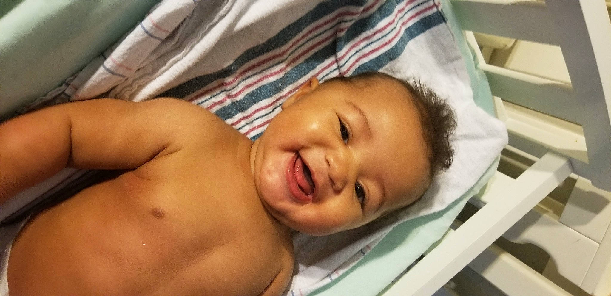 Vaeda is registered to the contest to win money with this photo: abdomen, baby, baby_laughing, cheek, chest, child, comfort, eye, happy, human_body, lip, mouth, neck, nose, person, skin, smile, stomach, thumb, toddler