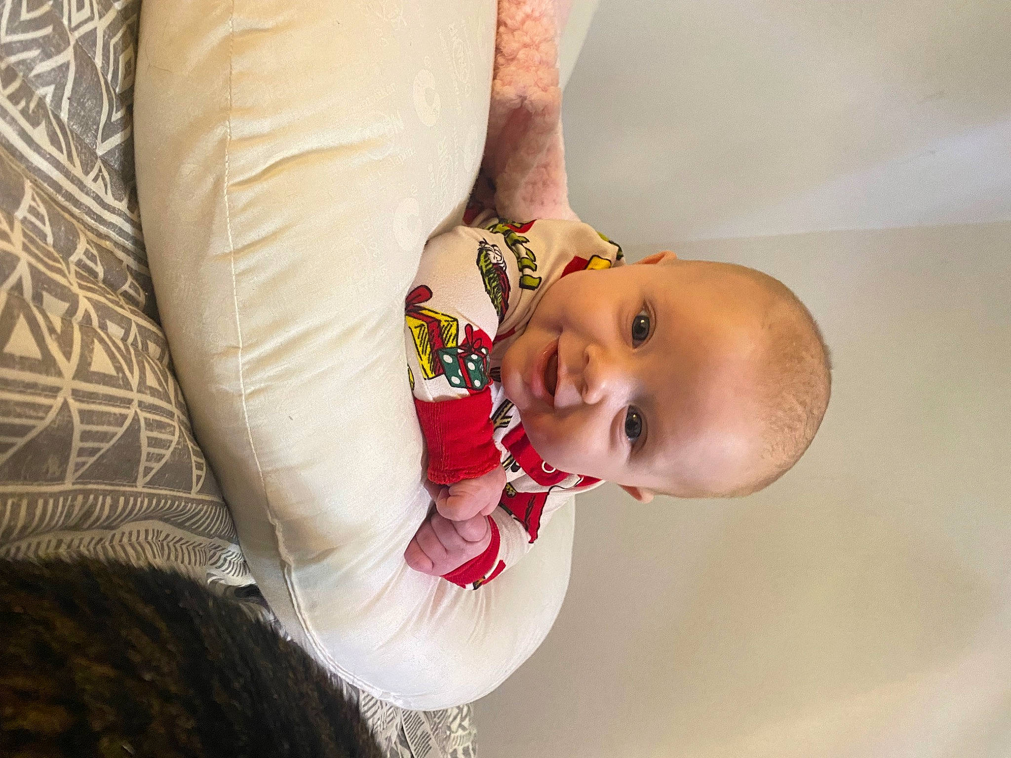 Avery is registered to the contest to win money with this photo: arm, baby, comfort, couch, elbow, eye, finger, flash_photography, gesture, hand, happy, head, human_body, lip, person, shoulder, smile, stomach, toddler, tree