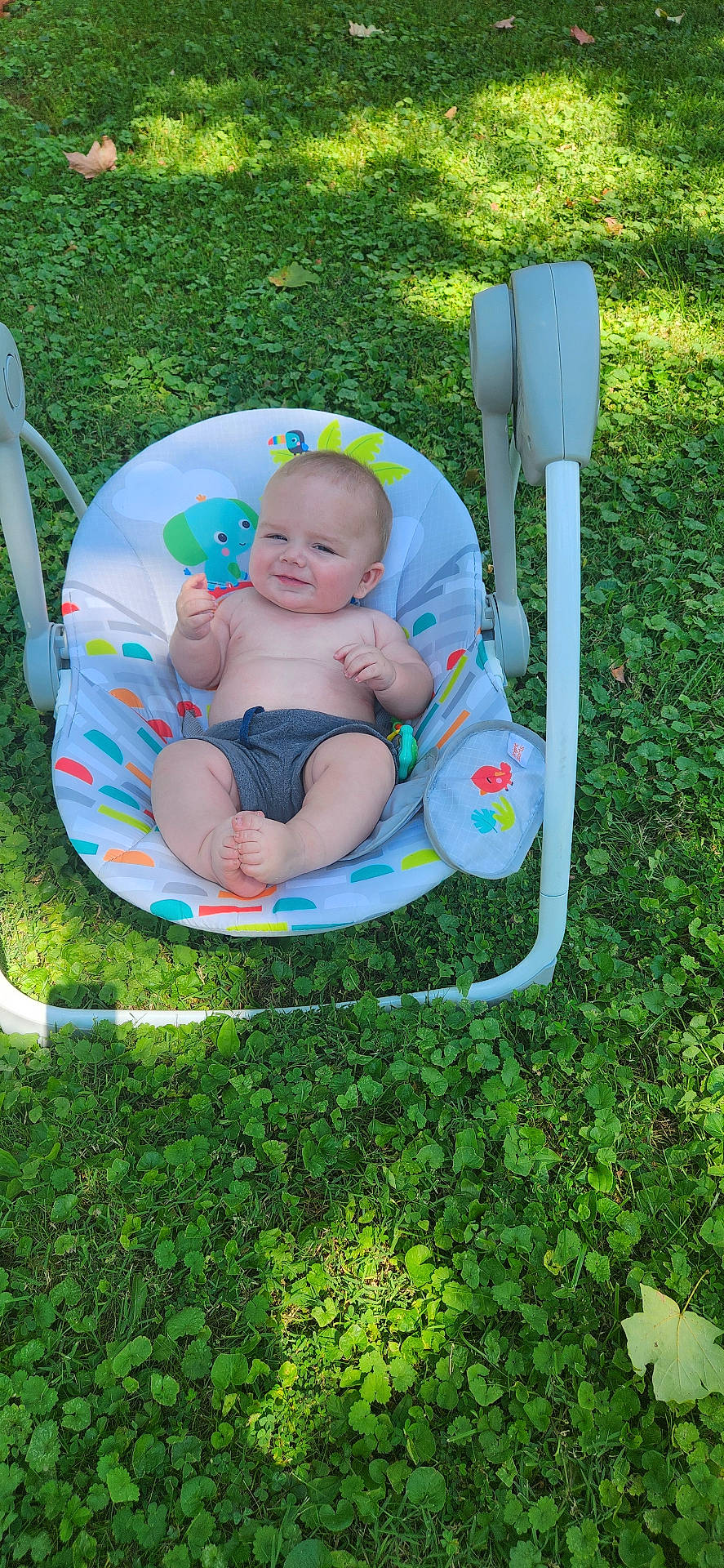 River is registered to the contest to win money with this photo: baby, backyard, crib, face, furniture, grass, head, infantbed, lawn, nature, newborn, outdoors, park, person, photography, plant, portrait, sleeping, summer, yard