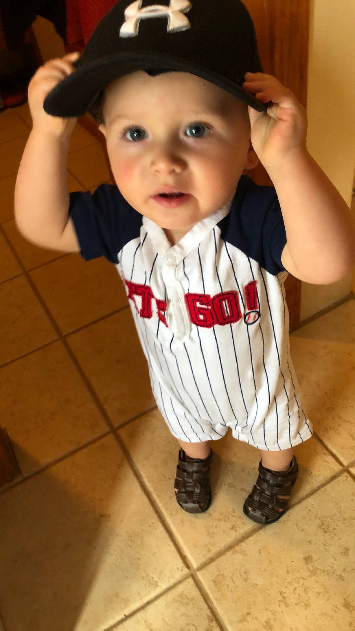 Dominik is registered to the contest to win money with this photo: baby, baby_toddler_clothing, cheek, child, child_model, cool, fashion_accessory, hat, headgear, headwear, outerwear, person, shoe, sleeve, t_shirt, toddler