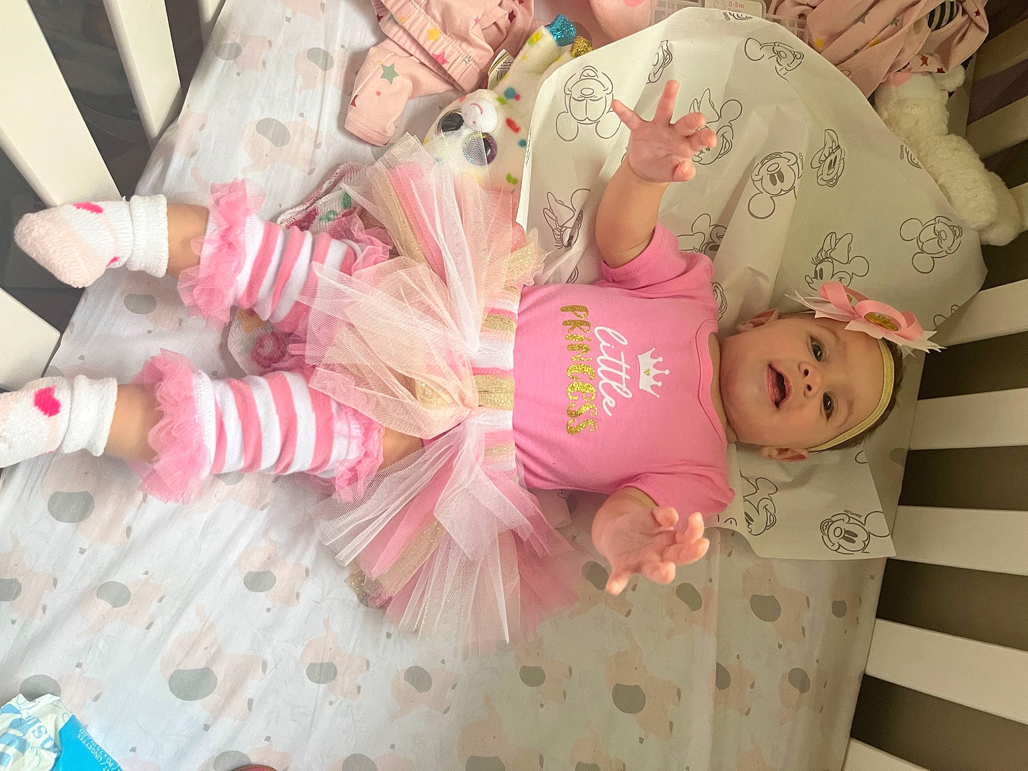 Harper is registered to the contest to win money with this photo: baby, baby_products, baby_toddler_clothing, cheek, child, event, fun, happy, headwear, human_body, magenta, nail, pattern, peach, person, pink, room, smile, toddler, toy