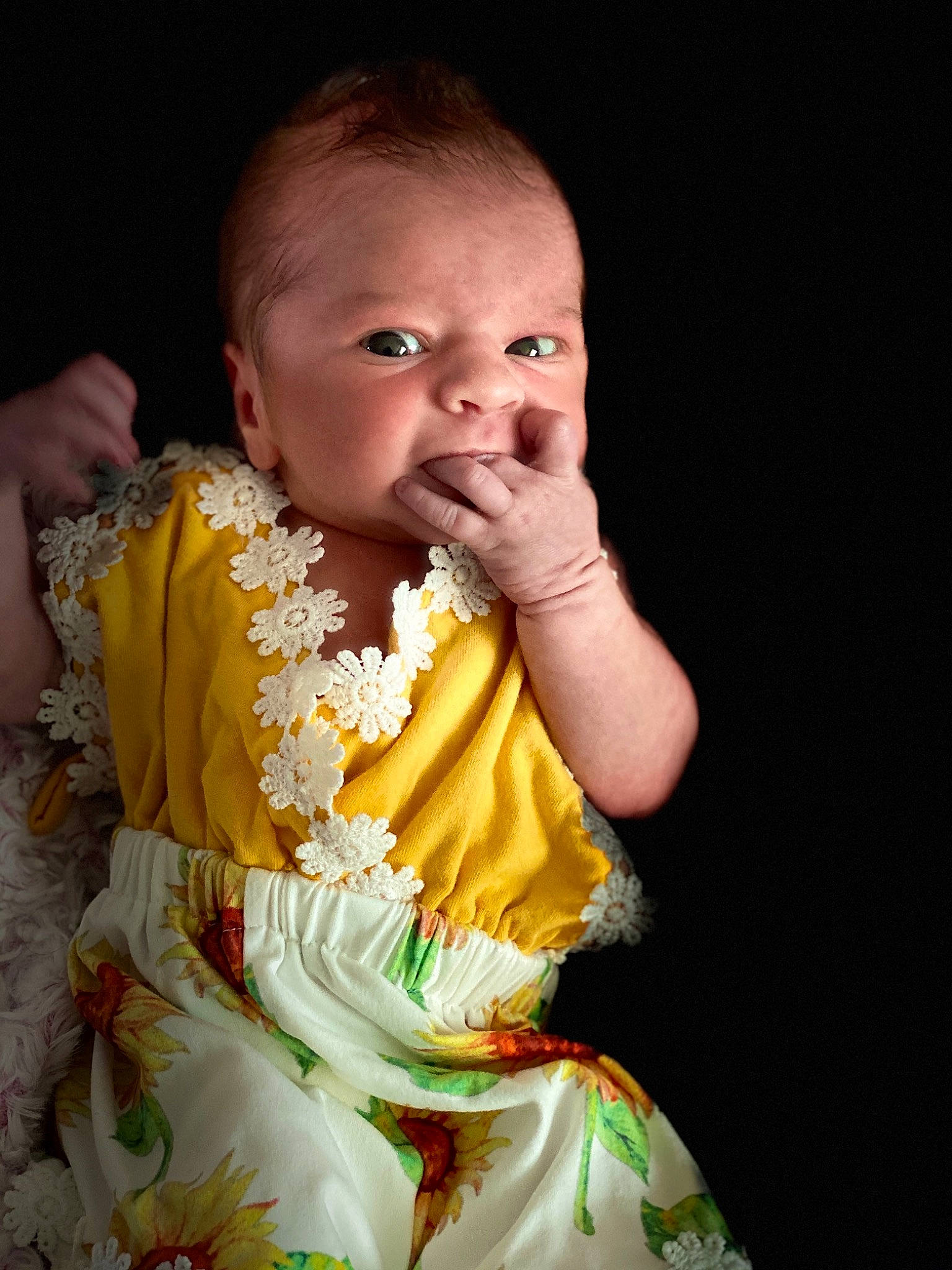 Haisley is registered to the contest to win money with this photo: baby, cheek, child, hand, mouth, nose, person, photography, sitting, smile, toddler, yellow