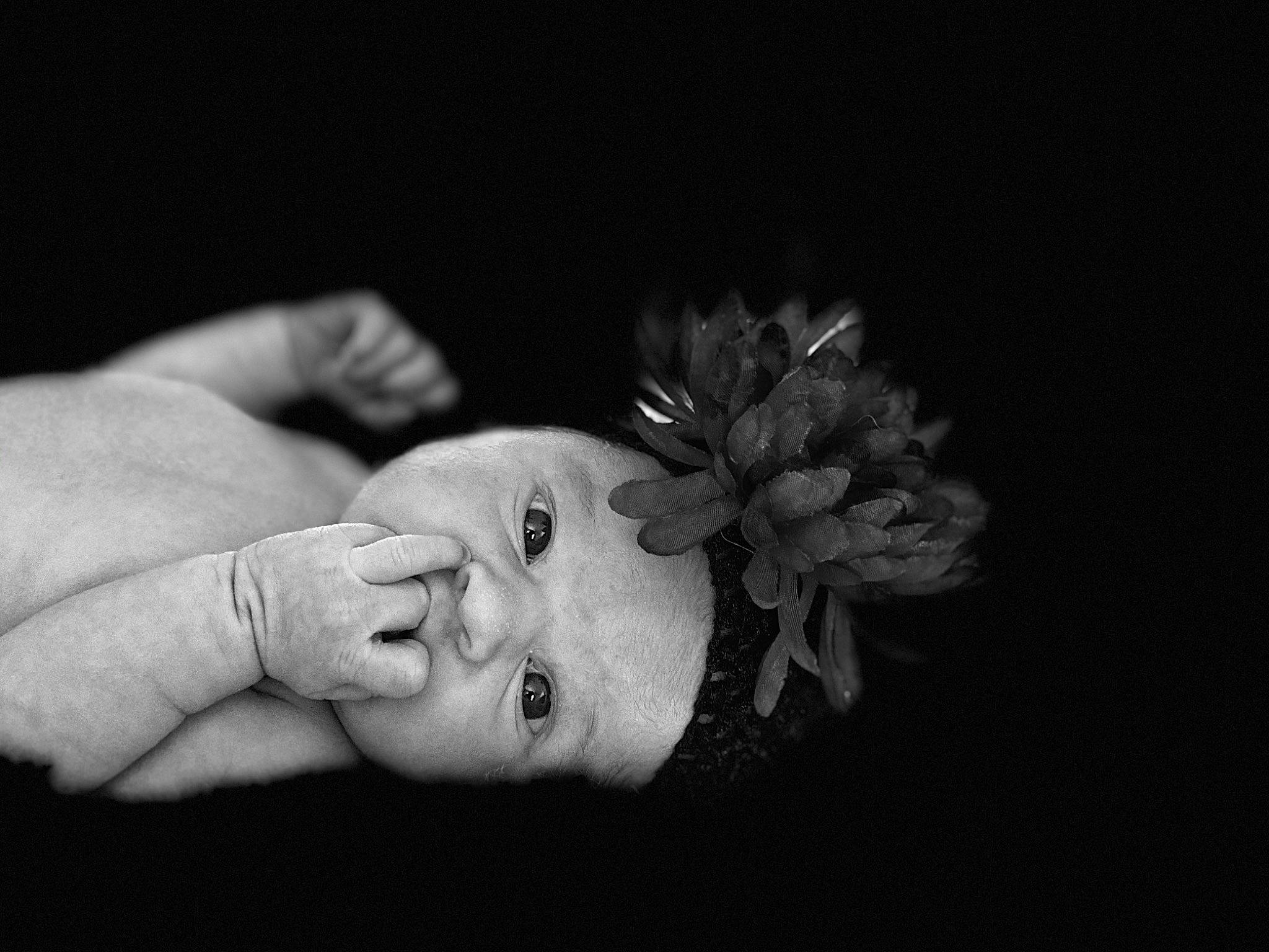 Haisley is registered to the contest to win money with this photo: arm, baby, black, black_and_white, child, close_up, eye, face, flash_photography, hand, head, human, monochrome, monochrome_photography, nose, person, photograph, photography, portrait, skin