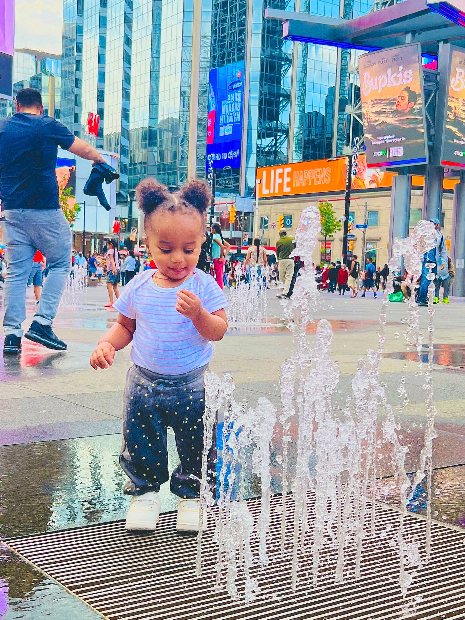 Aaliyah joined the competition — help win amazing prizes! blue, city, fountain, fun, happy, leisure, pedestrian, person, photograph, recreation, reflection, sidewalk, sky, snapshot, street, t_shirt, toddler, travel, water, water_feature