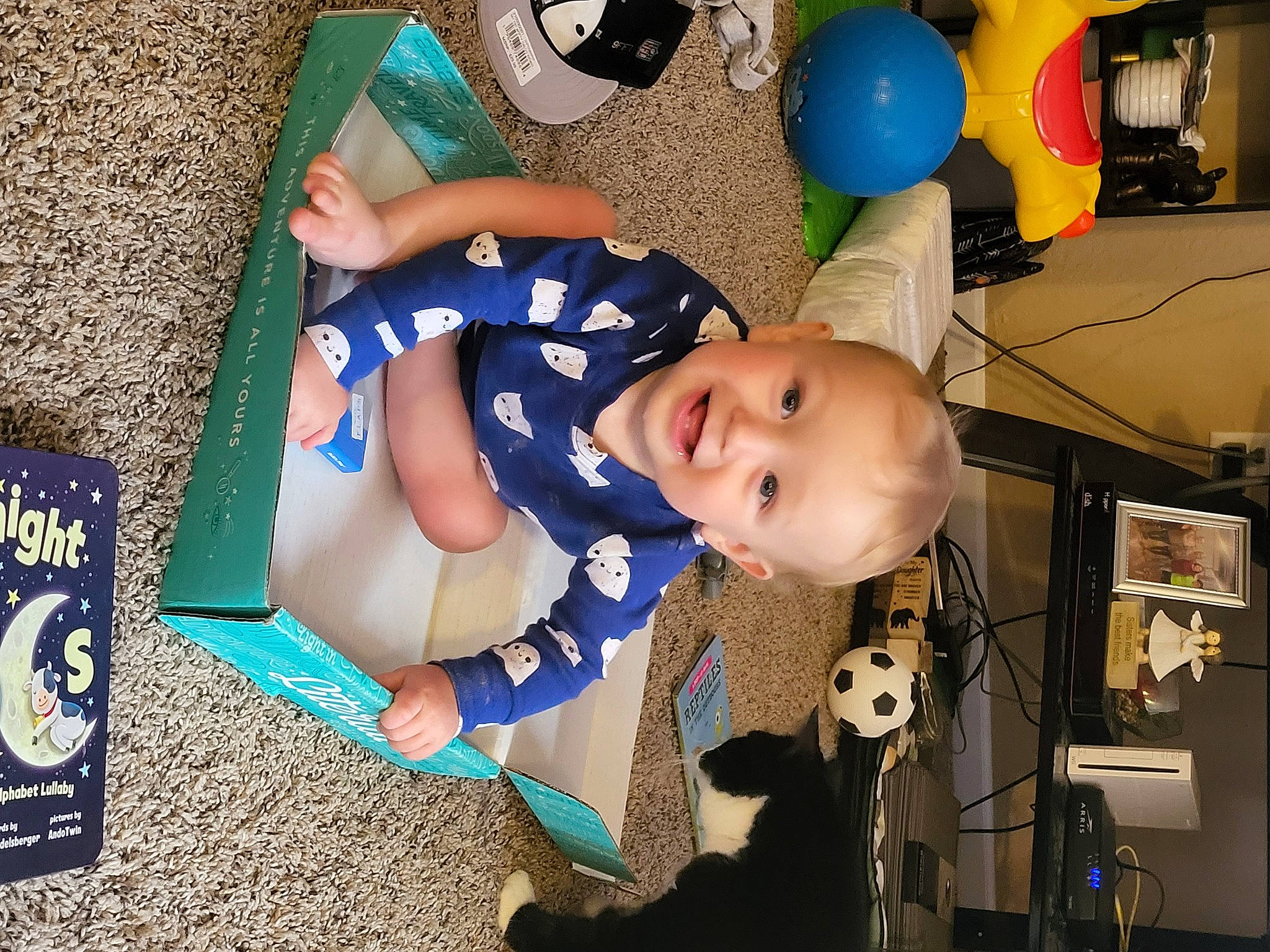 Aydin joined the competition — help win amazing prizes! baby, baby_products, baby_toddler_clothing, balloon, blue, child, electric_blue, fun, grass, green, happy, leisure, logo, person, play, room, sitting, smile, toddler, toy