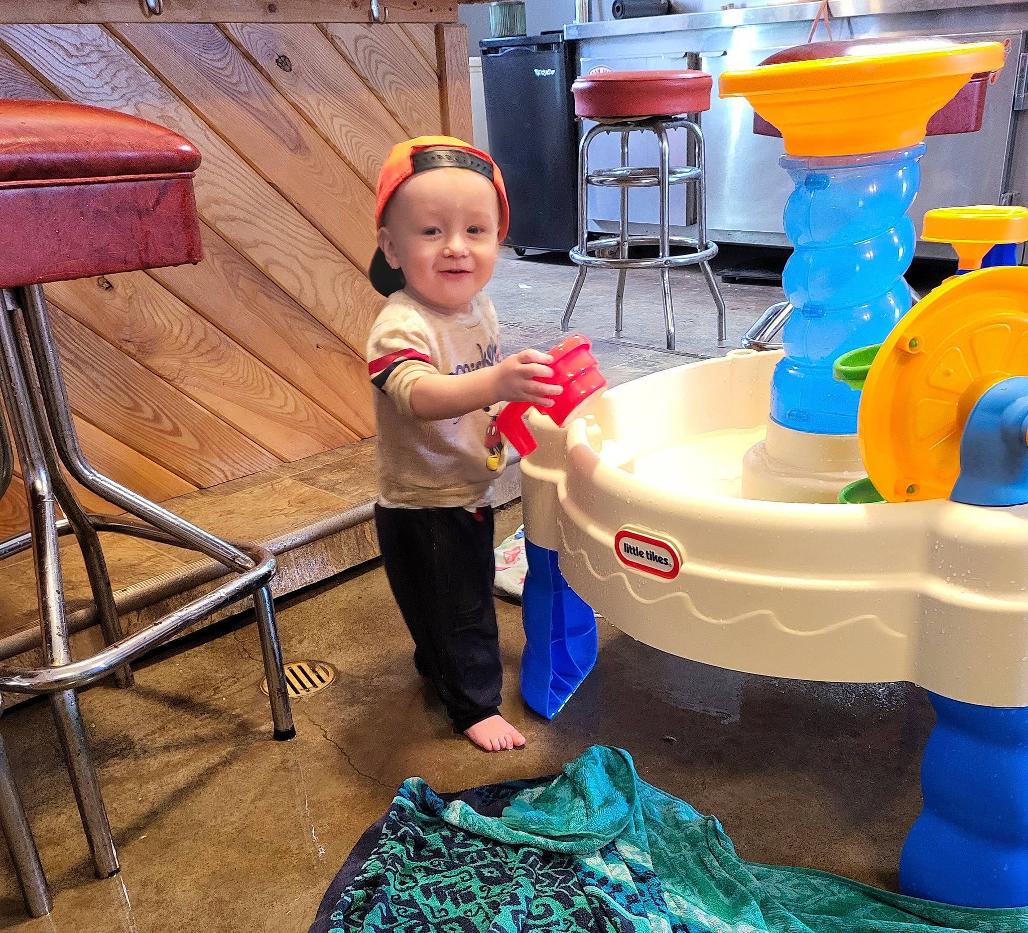 Aydin joined the competition — help win amazing prizes! baby_toddler_clothing, blue, chair, child, electric_blue, flooring, fun, gas, happy, headwear, joy, leisure, outdoor_furniture, person, plastic, play, recreation, shorts, smile, t_shirt