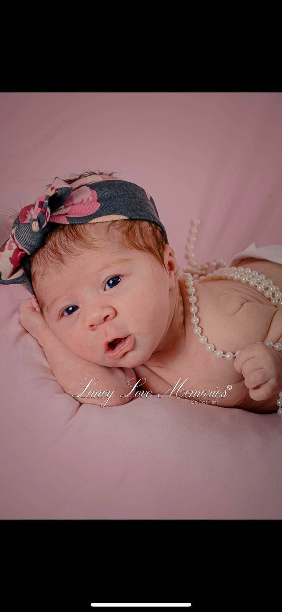 Remington joined the competition — help win amazing prizes! baby, baby_toddler_clothing, cheek, child, chin, embellishment, eye, eyelash, face, flash_photography, happy, headband, headgear, headpiece, iris, jewellery, lip, person, pink, skin
