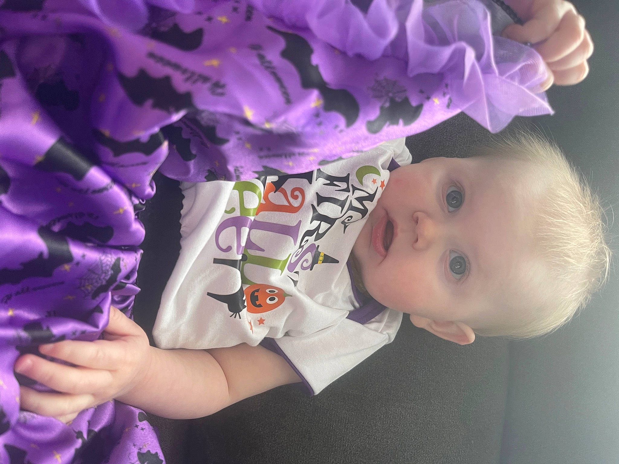 Tennessie Rae is registered to the contest to win money with this photo: baby, baby_products, baby_toddler_clothing, cheek, child, eyelash, fashion_accessory, fun, happy, magenta, person, petal, pink, purple, surprise, toddler, violet