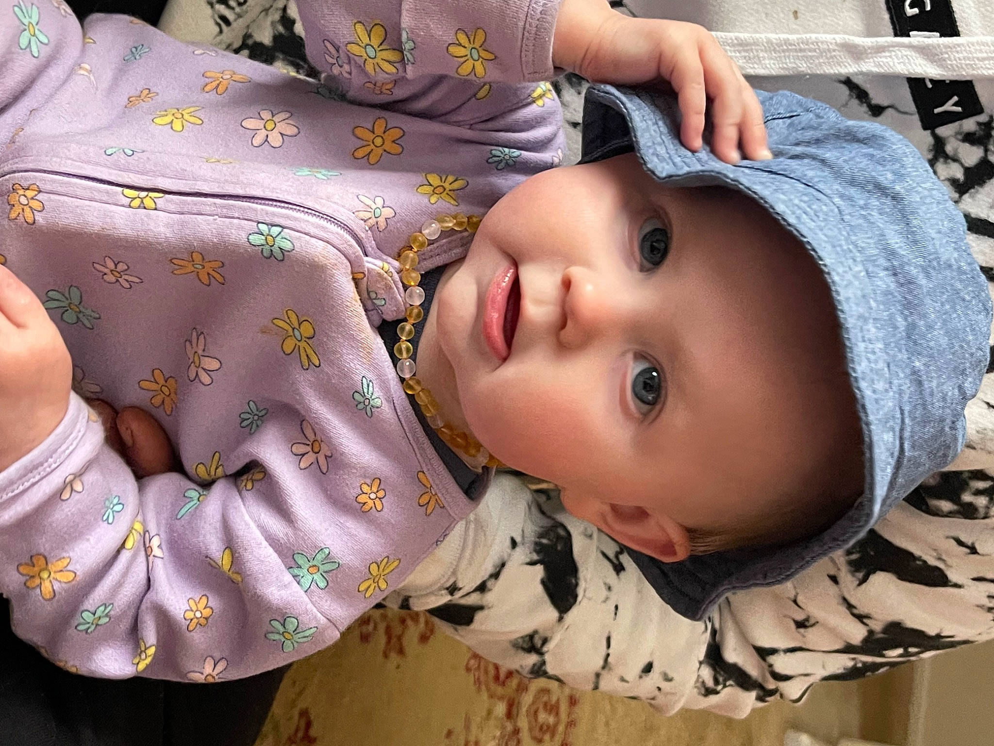 Tennessie Rae is registered to the contest to win money with this photo: baby, baby_toddler_clothing, cap, cheek, child, chin, eyelash, fashion_accessory, fur, happy, hat, headwear, lip, mouth, nose, pattern, person, portrait_photography, skin, toddler