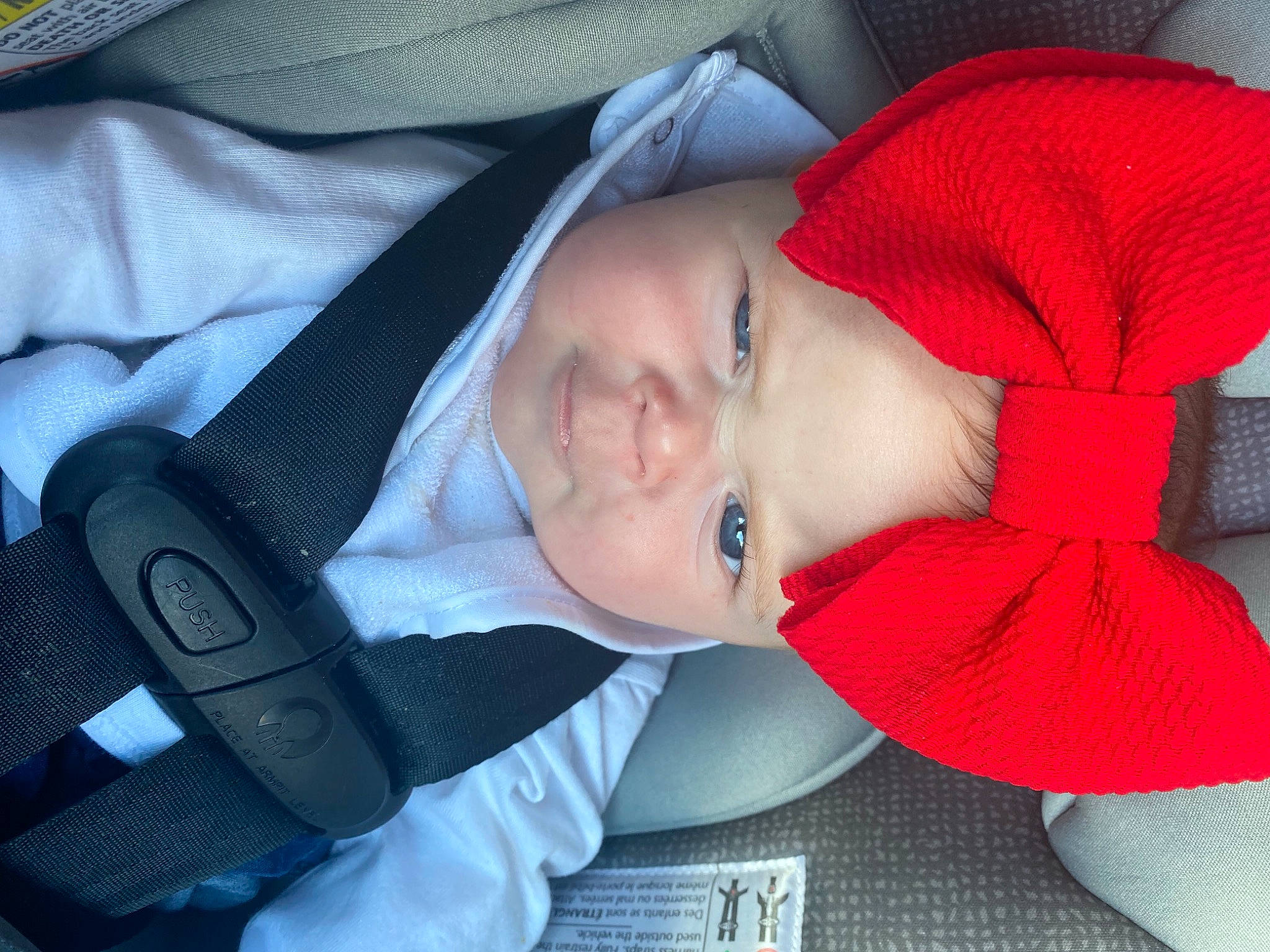 Emerie joined the competition — help win amazing prizes! baby, baby_products, baby_toddler_clothing, carmine, cheek, child, collar, comfort, electric_blue, face, fashion_accessory, head, headwear, lip, outerwear, pattern, person, product, skin, sleeve