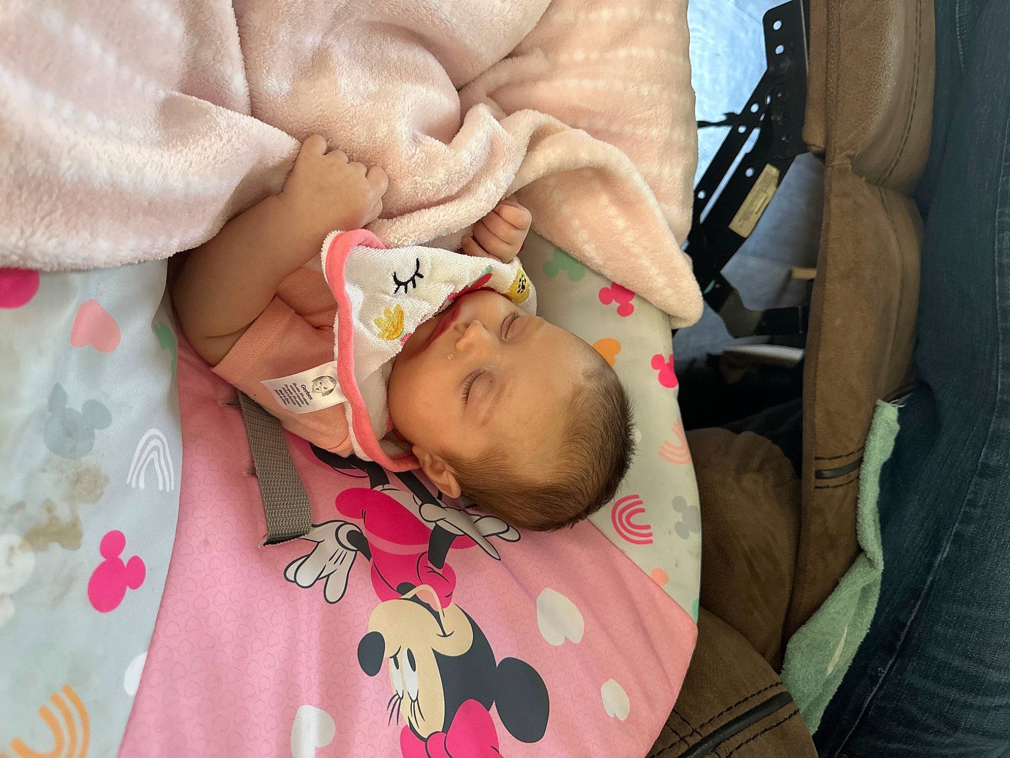 Amberly is registered to the contest to win money with this photo: auto_part, baby, baby_products, baby_sleeping, baby_toddler_clothing, bedtime, car_seat, carmine, cheek, child, comfort, hat, human_body, linens, nap, pattern, person, room, skin, sleep