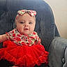 Mia joined the competition — help win amazing prizes! baby, blue_chair, child, clothing, cushioned_chair, cute, fashion, happy, headband, indoor, infant, minnie_mouse, person, pink_socks, portrait, seated, smiling, strawberry_pattern, tutu_skirt, young