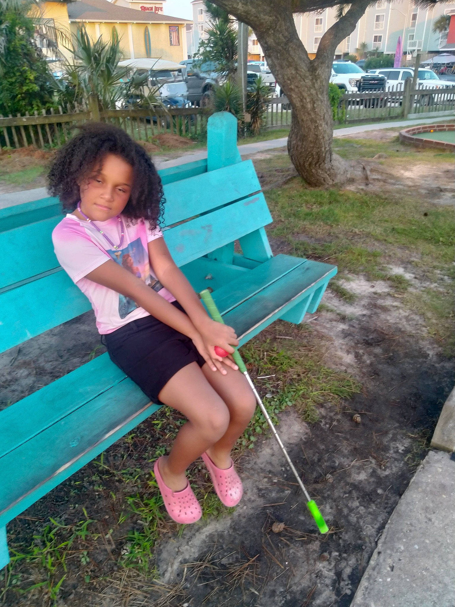 Karissa joined the competition — help win amazing prizes! electric_blue, fun, grass, green, hairstyle, happy, human_leg, knee, leg, leisure, magenta, outdoor_furniture, people_in_nature, person, pink, plant, recreation, sandal, textile, thigh