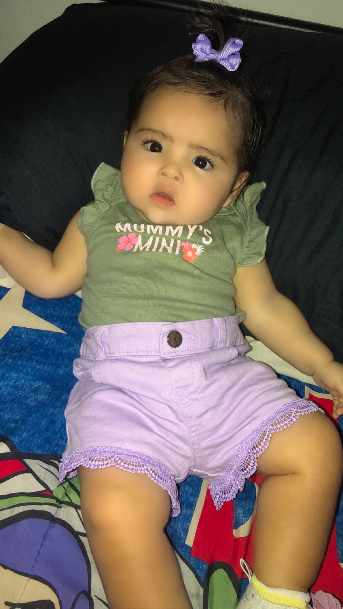 Nalianna is registered to the contest to win money with this photo: baby_toddler_clothing, black, blue, cheek, chin, clothing, comfort, eye, finger, hairstyle, happy, iris, leg, neck, organ, person, pink, skin, sleeve, thigh