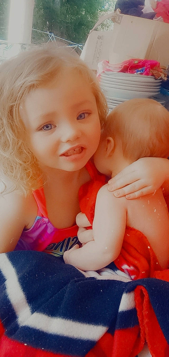 Bella joined the competition — help win amazing prizes! baby, baby_toddler_clothing, cheek, comfort, eye, facial_expression, finger, fun, gesture, hand, happy, head, interaction, iris, lip, mouth, muscle, person, pink, skin