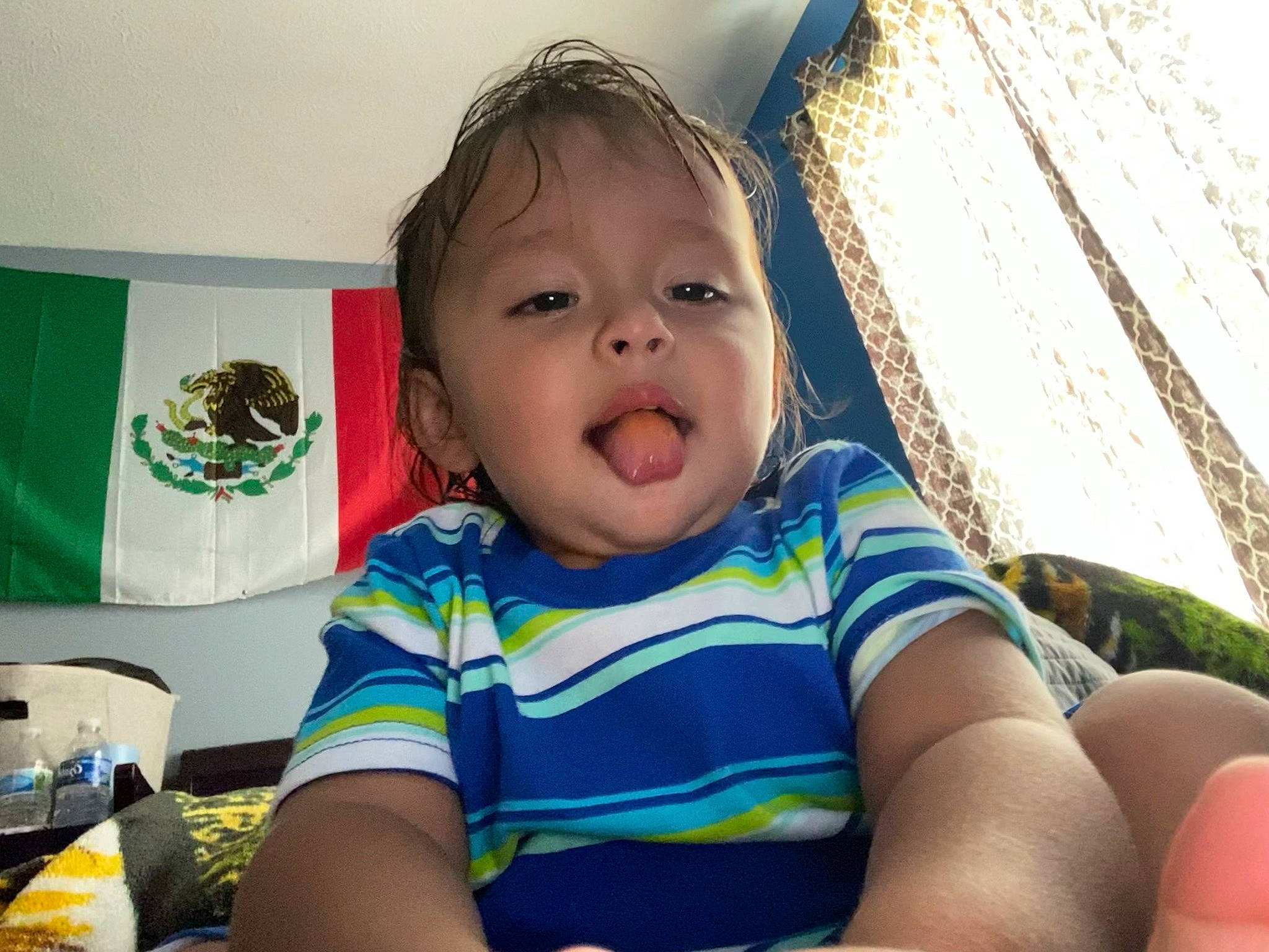 Felix is registered to the contest to win money with this photo: baby, baby_toddler_clothing, cheek, child, close_up, eye, eyebrow, eyelash, fun, grass, happy, iris, leisure, mouth, nose, person, sitting, skin, smile, toddler