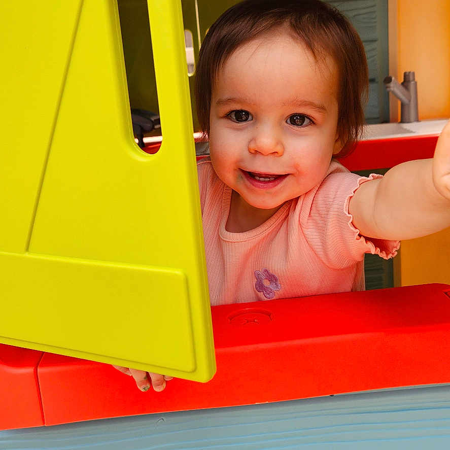 Mollie joined the competition — help win amazing prizes! baby, bodypart, face, finger, hand, head, indoors, outdoors, person, photography, playarea, portrait, railway, shelf, sink, sinkfaucet, train, transportation, vehicle, wood