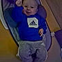 Maxence participe au concours pour gagner de l'argent avec cette photo : adidas_logo, baby, baby_gesture, blue_sweatshirt, child, clothing, comfortable, cozy, cushioned_seat, cute, fabric, gray_pants, indoor, infant, person, playful, portrait, raised_arm, smiling, young_child
