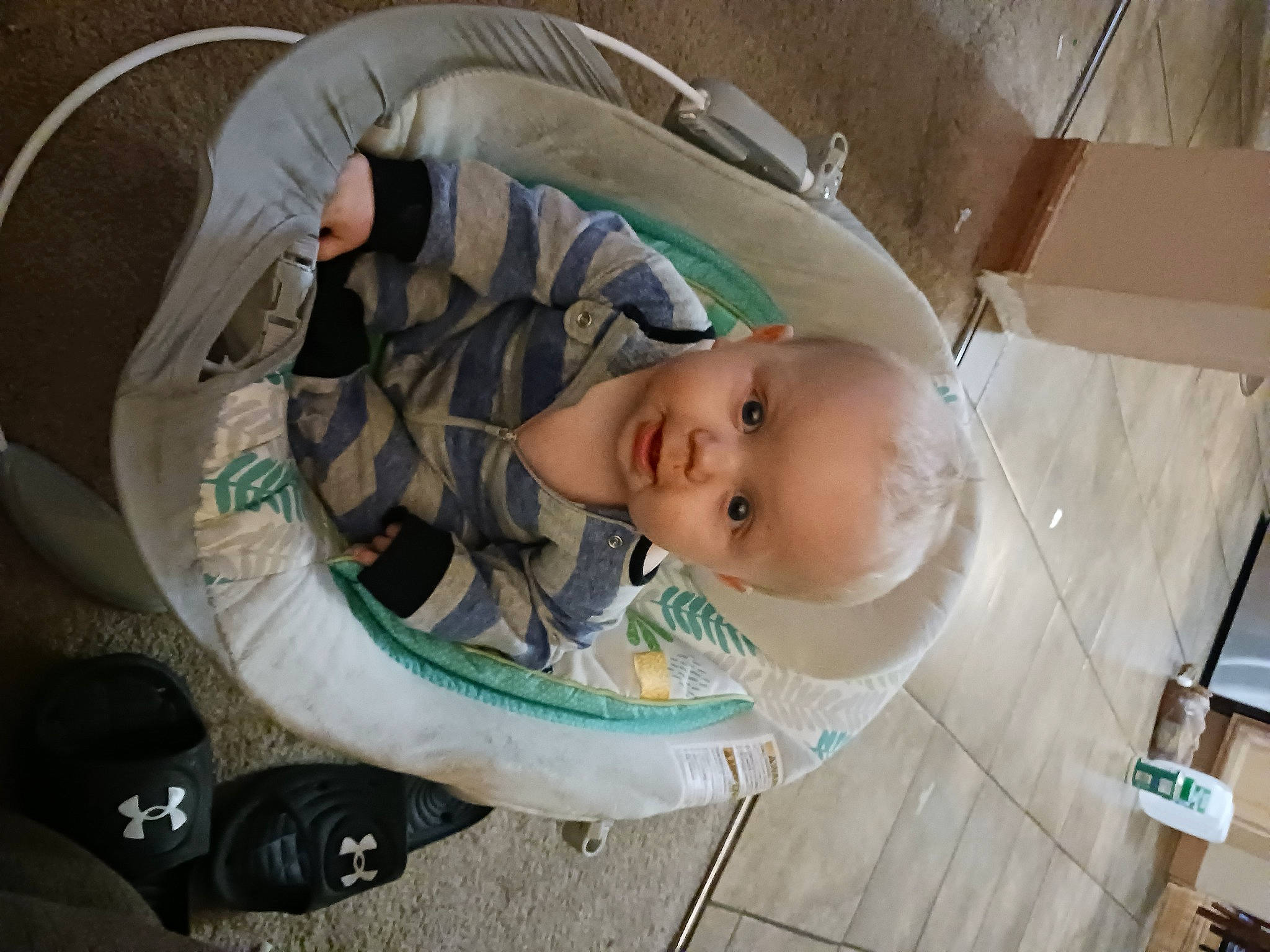 Timothy joined the competition — help win amazing prizes! baby, baby_carriage, baby_products, baby_safety, baby_toddler_clothing, car_seat, child, circle, comfort, person, sitting, smile, toddler, wheel, wood