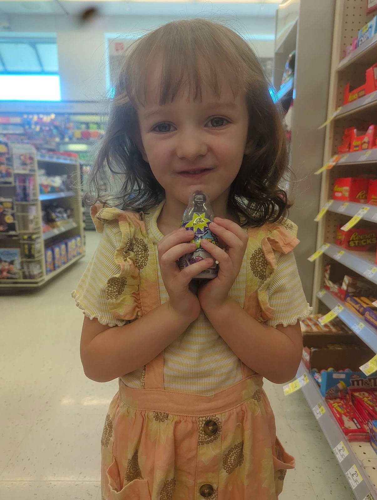 Octavianna joined the competition — help win amazing prizes! cheek, child, chin, finger, fun, hairstyle, hand, happy, human_body, iris, joy, mammal, person, retail, shelf, shelving, skin, smile, standing, thumb