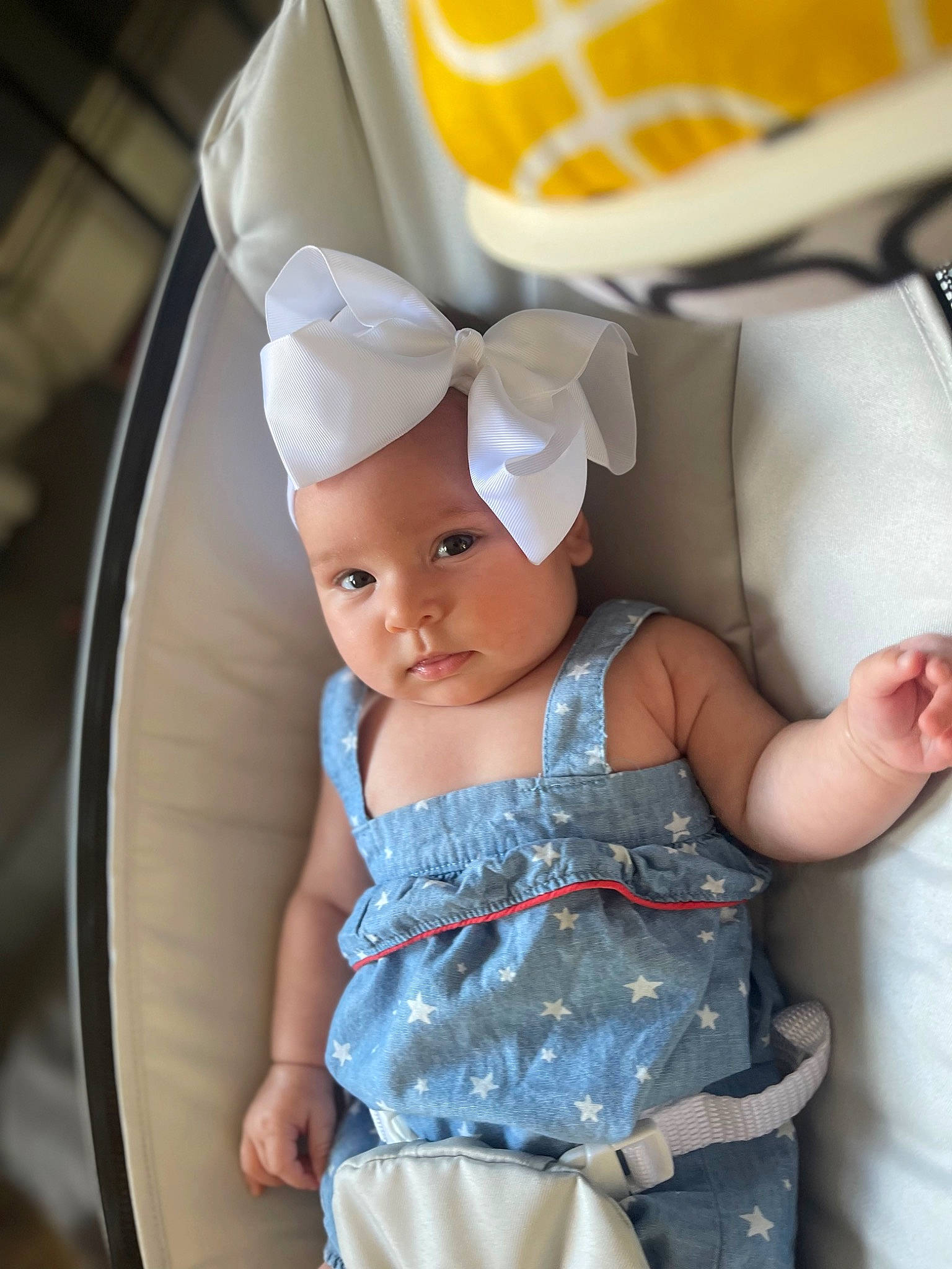 Delilah is registered to the contest to win money with this photo: baby, baby_carriage, baby_products, baby_toddler_clothing, cap, child, comfort, fashion_accessory, fun, happy, headwear, pattern, person, product, skin, sleeve, sock, thigh, toddler, trunk