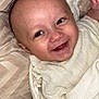 Forrest joined the competition — help win amazing prizes! baby, smile, face, infant, clothing, pillow, blanket, cozy, happy, child, cute, skin, expression, lying_down, comfort, indoors, portrait, closeup, person, soft_fabric