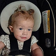 Sianna joined the competition — help win amazing prizes! toddler, child, car_seat, blanket, hair, pigtails, face, straps, clothing, indoor, baby, seat, expression, person, portrait, infant, cute, young, sitting, headrest