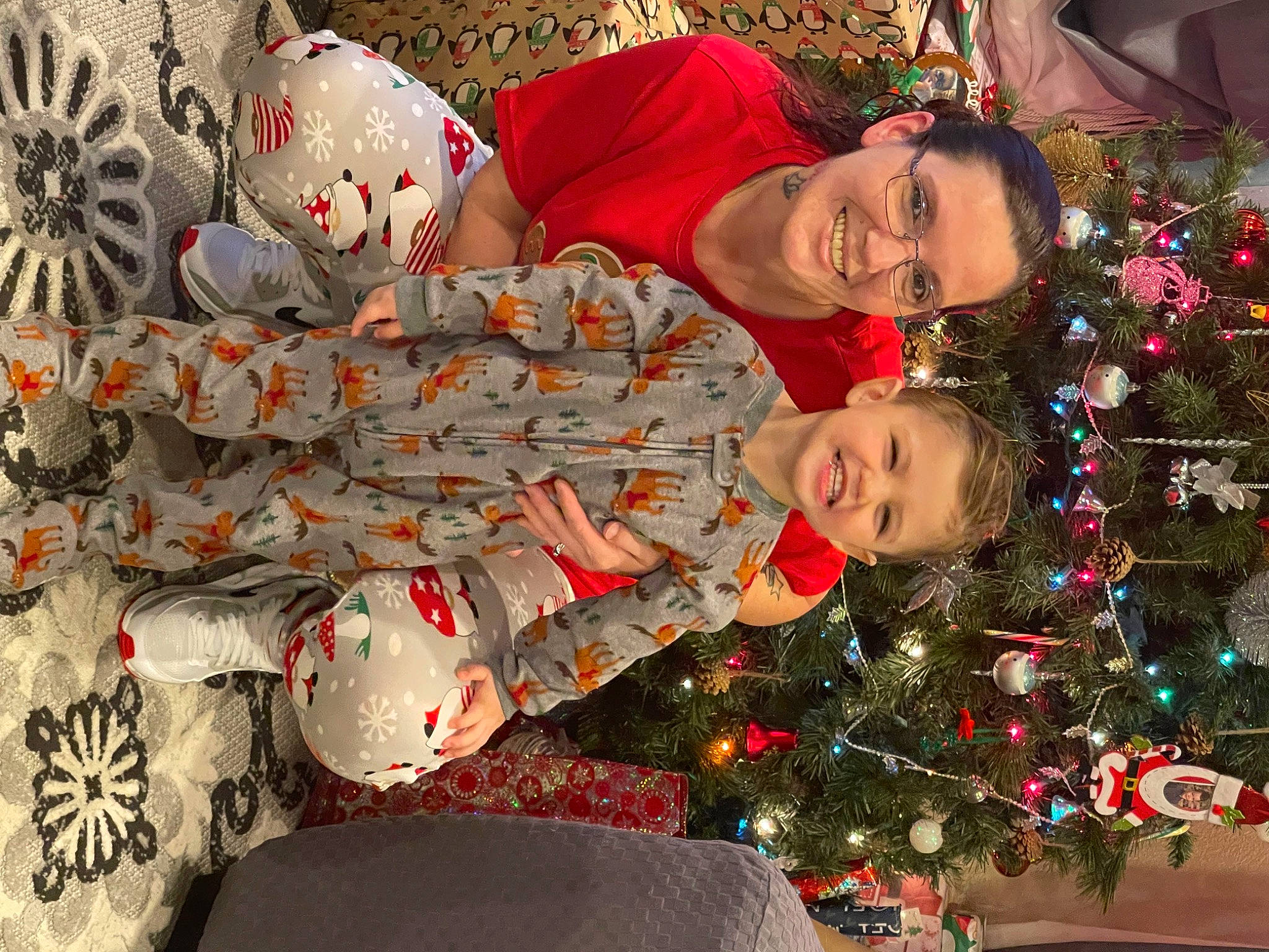 Braden joined the competition — help win amazing prizes! child, christmas, christmas_decoration, christmas_eve, christmas_ornament, christmas_tree, conifer, event, fun, happy, holiday, holiday_ornament, joy, lap, ornament, person, plant, room, smile, tradition
