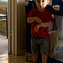 David a rejoint le concours — aidez-le/la à gagner de superbes lots ! casual_clothing, child, curious, daylight, denim_shorts, expression, floor, furniture, hair, home, indoor, natural_light, person, playpen, red_shirt, room, sneakers, standing, toddler, young
