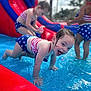 Lilyana joined the competition — help win amazing prizes! child, children, swimsuit, inflatable_pool, water, splashing, playing, summer, outdoor, slide, red, blue, star_pattern, happy, crawling, fun, pool, sunny, smiling, person