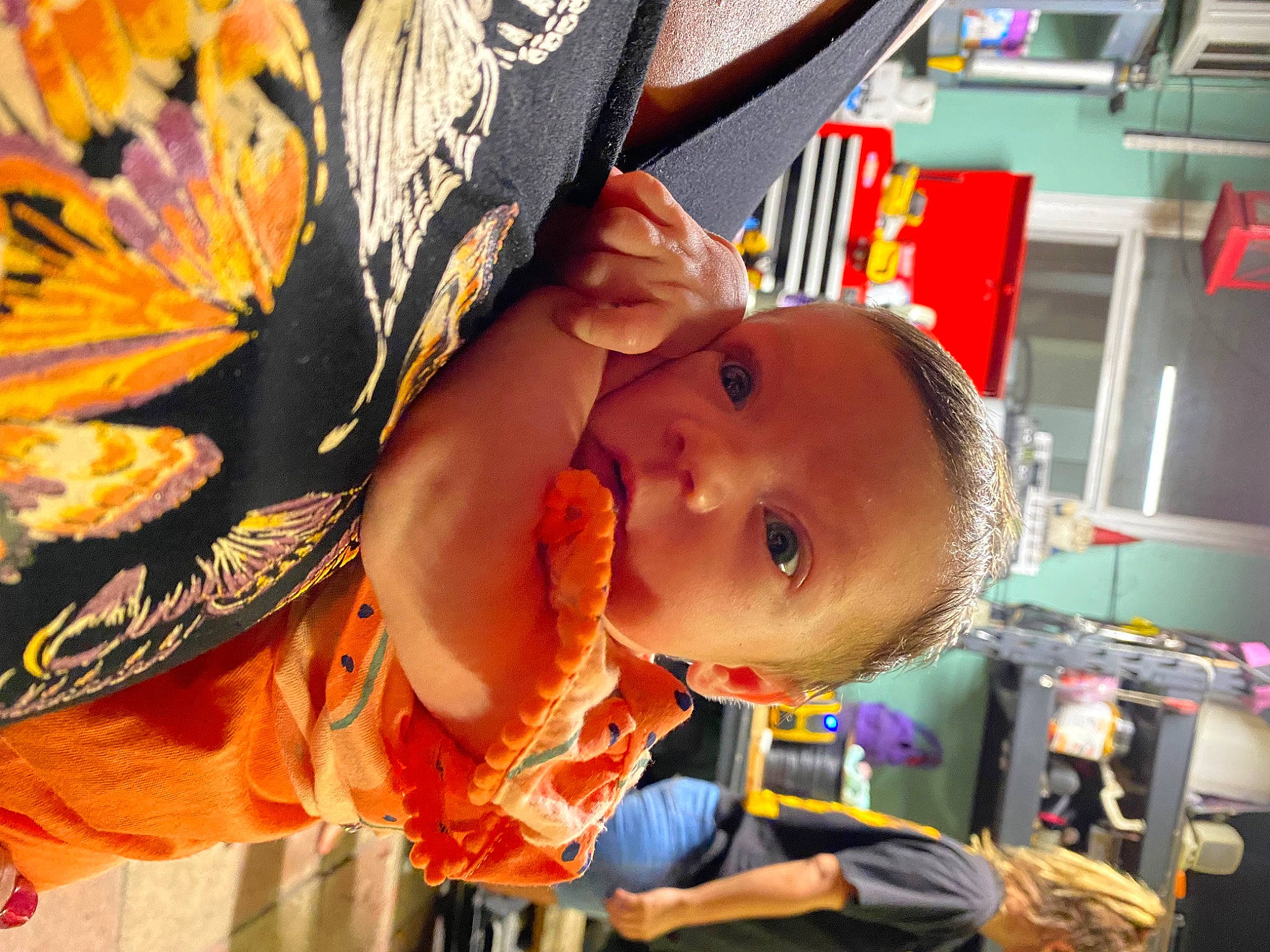 Lilah is registered to the contest to win money with this photo: baby, baby_products, cheek, child, event, fashion_accessory, fun, happy, hat, leisure, orange, pattern, person, photography, play, room, smile, snapshot, toddler, tradition