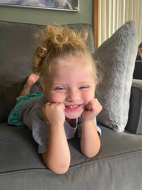 Nora joined the competition — help win amazing prizes! blond, brown_hair, cheek, child, comfort, eyebrow, finger, flooring, fun, gesture, hairstyle, happy, joy, lip, person, picture_frame, room, shoulder, sitting, skin